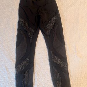 Lululemon wunder train  7/8 in black with lace design.